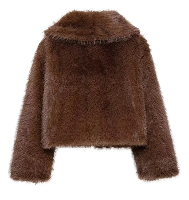 Brown fluffy jacket on a white background
