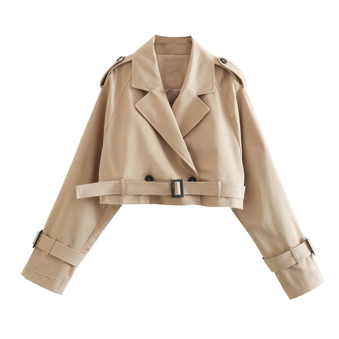 Beige trench coat with a belt on a white background