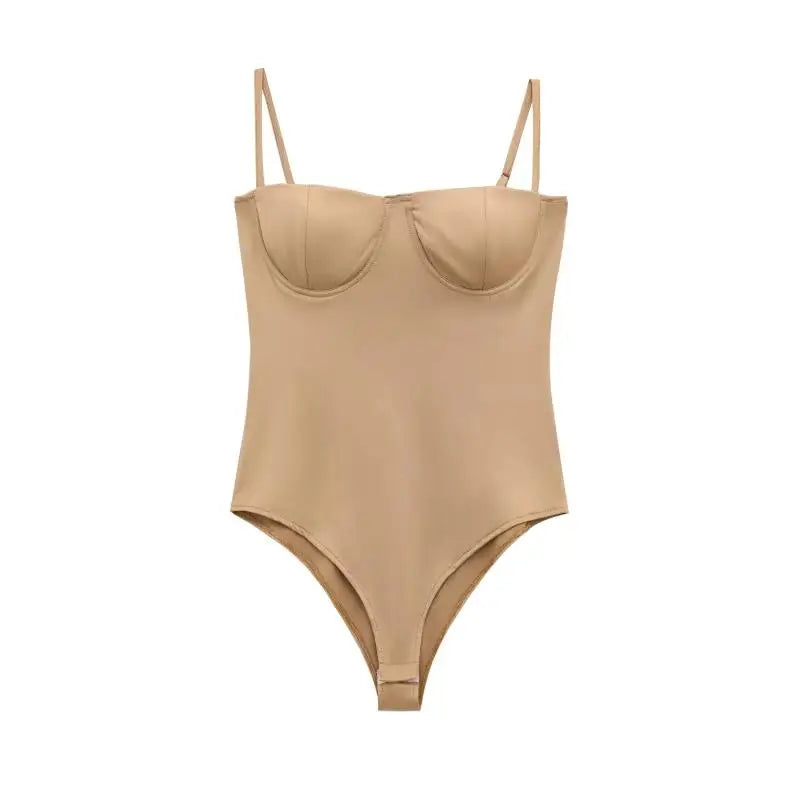 Beige swimsuit with thin straps on a white background